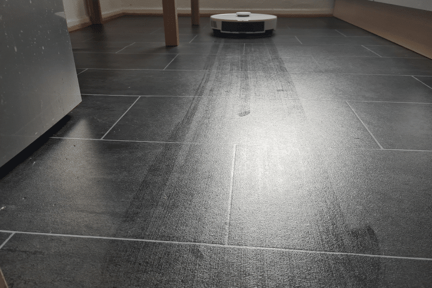 Roborock S7 Pro Ultra mops a PVC floor in the kitchen.